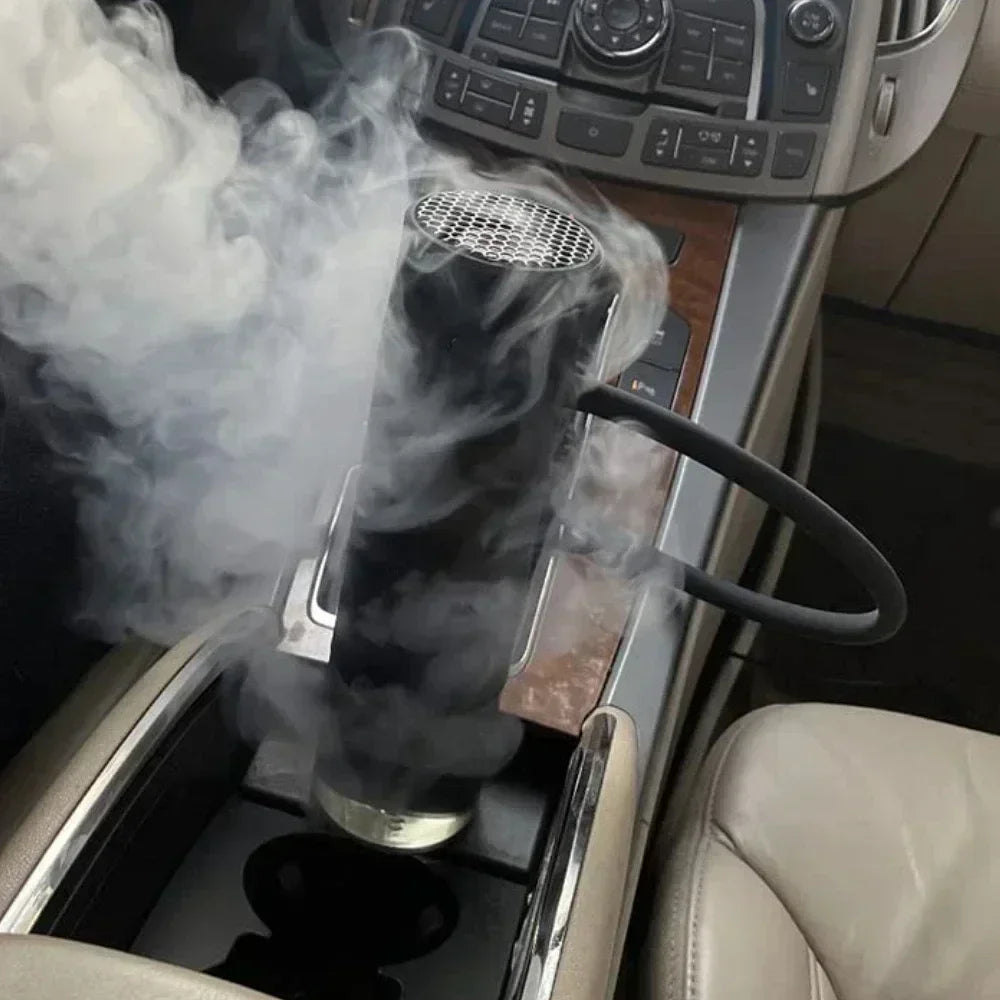 Car portable hookah emitting smoke inside a vehicle